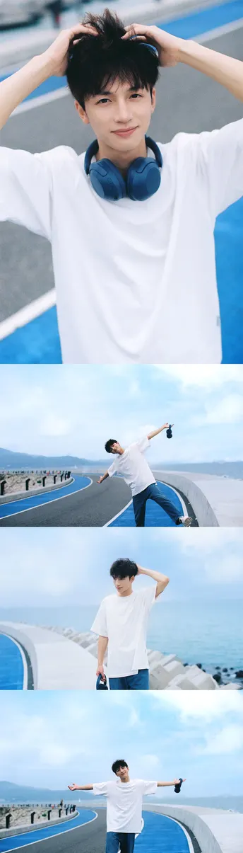 一个穿着衬衫和滑板鞋的男孩