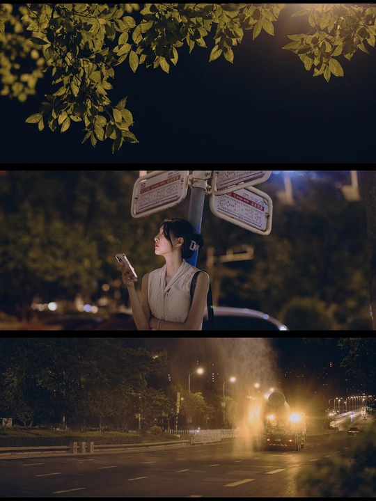 夜晚站在街上的女人 手持香烟 看着手机上的标志