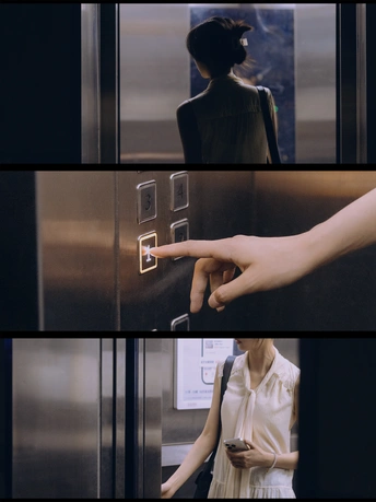 一个站在电梯里 伸出手指触摸的女子