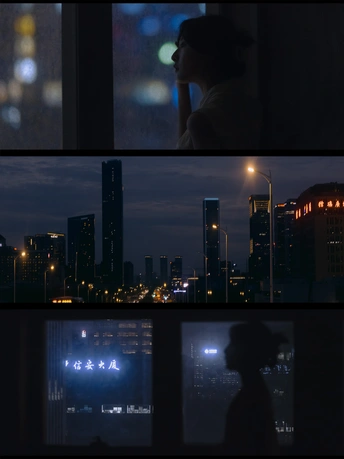 夜晚的城市照片 一个人物轮廓在窗口向外看其他建筑的天际线。