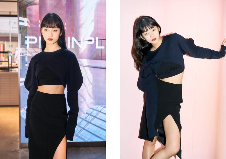 一位穿着黑色上衣和黑色裙子的女性正在为拍照姿势