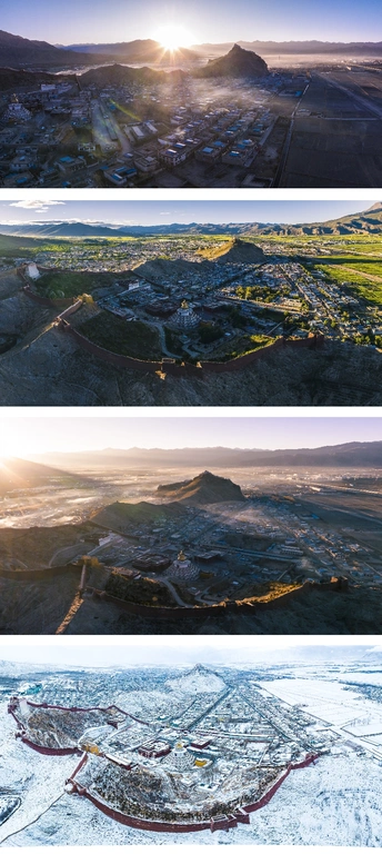 aerial photo shows a panorama of a city at sunrise