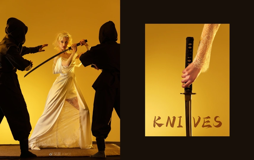 一个拿剑的男人和一个穿裙子的女人在舞台上