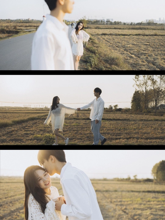 一个人和一个人手拉手在空地上走下公路