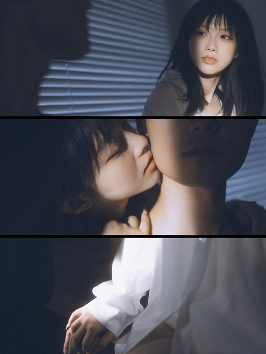 一位正在窗口向外看的女士的图像