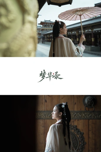 一座雕像的图片和一位举着伞的女人站在建筑物前的图片