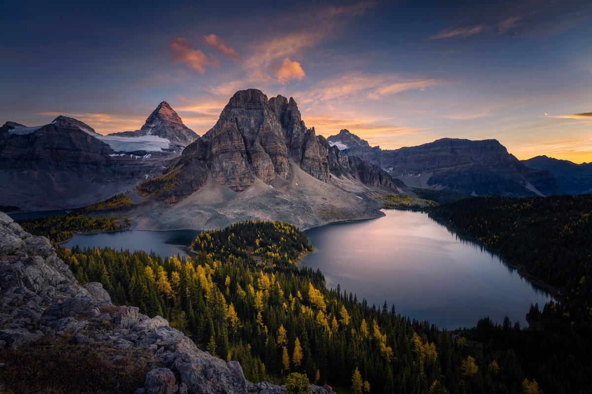 sunrise over a lake in the valley of the ten peaks