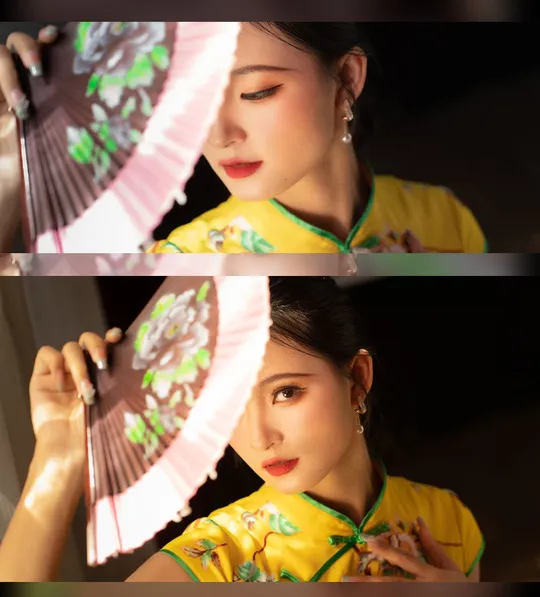 一位穿着黄色连衣裙的女孩拿着粉色雨伞