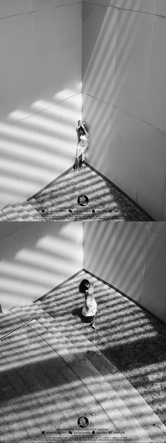 建筑的一个角落 墙壁是白色的 消防栓正坐在地板中间。