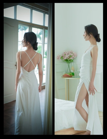 一个女人穿着白色婚纱的照片