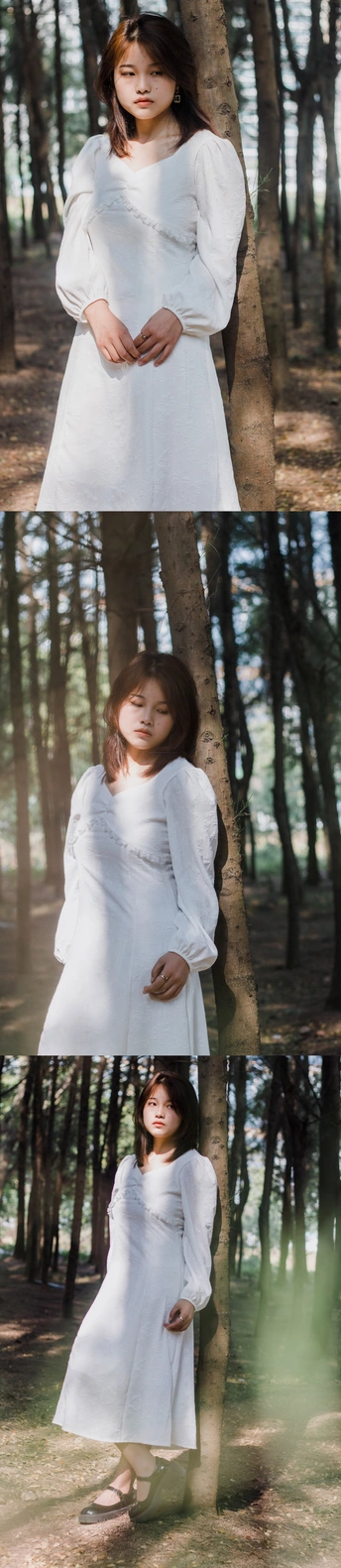 一个穿着白色连衣裙的孕妇站在树林里的分裂图像