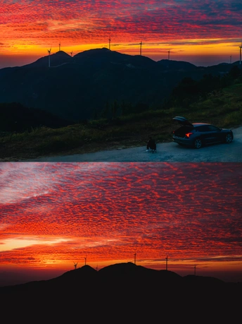 当太阳落山时 一辆车在山丘上行驶。