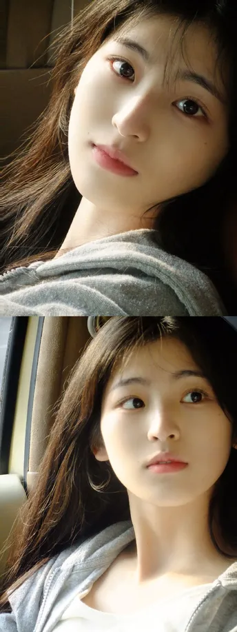 两年轻女子坐在汽车后座