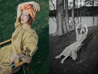 一张黑白照片 一位女性坐在椅子上