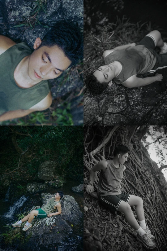 一位女子躺在小溪边的一块岩石上 一个年轻男孩坐在森林中的一棵树下。