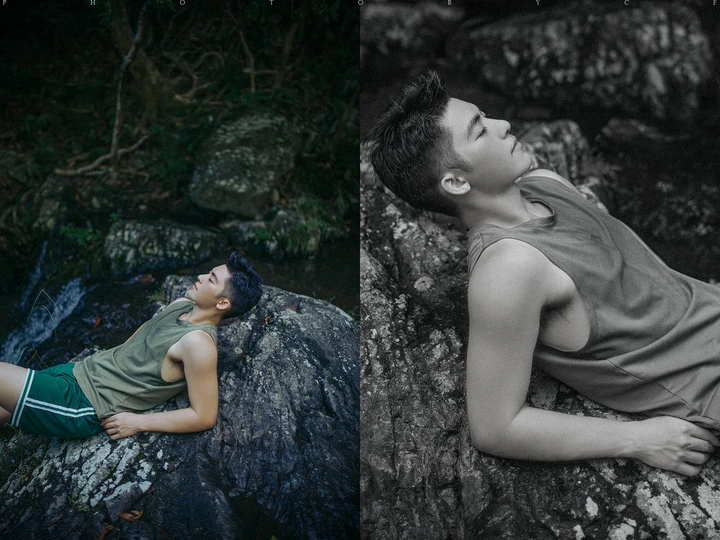 一些岩石上躺着两个年轻男子 在森林中。