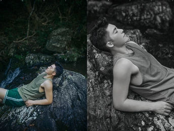 一些岩石上躺着两个年轻男子 在森林中。