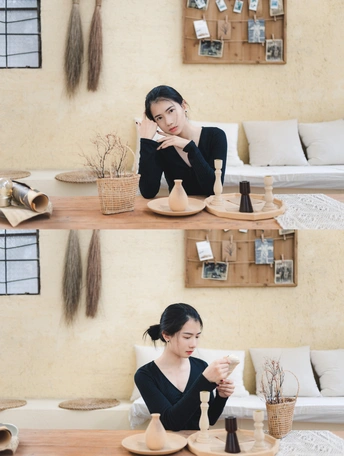 一个女人坐在客厅的木桌旁 喝着一杯咖啡