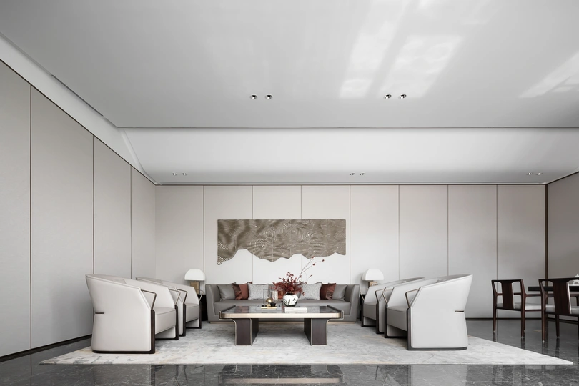 一个现代化的客厅 墙壁为白色 有一张大型桌子和椅子。