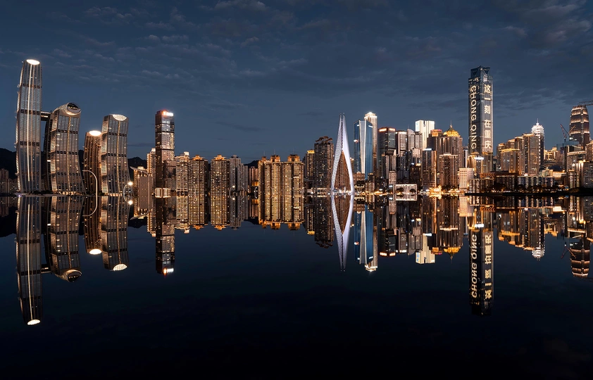 城市的天际线 摩天大楼和夜晚水面上的灯光反射