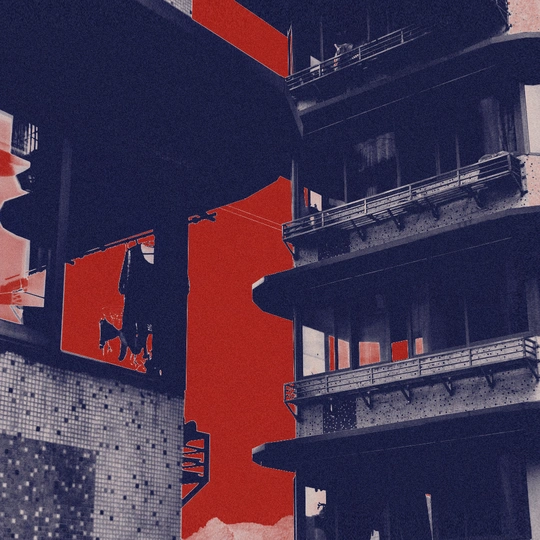 在城市的一座大楼前的一个交通信号灯