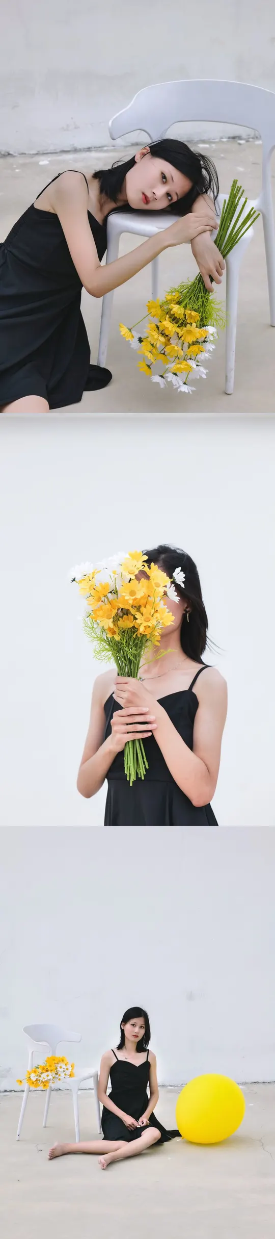 穿黑色连衣裙的女子抱着黄色花