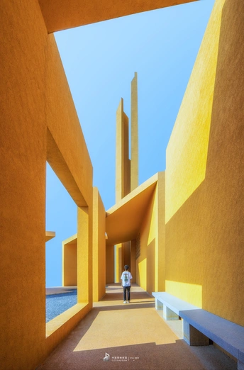 一个人穿过两栋黄色建筑之间的天空