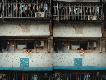 一位女士正在查看她房间的窗户