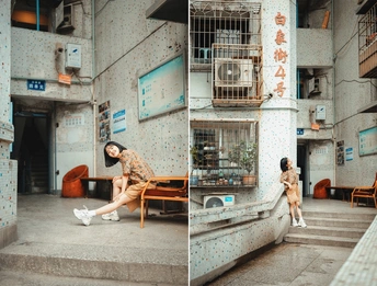 在中国武汉市的建筑物前 一位女士正在长凳上蹲着 楼梯上有狗和猫。