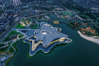 夜晚的现代城市 aerial view  中间有岛屿的水中  直接输出答案  不需要提示