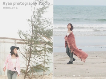 一位站在海滩上的女士 带着一条毛毯和一张女孩 walking 的图片。