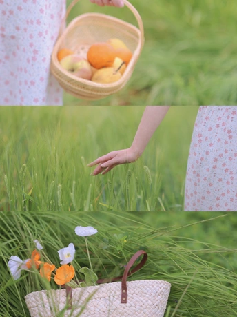 一个小女孩拿着一个装满水果和花的花篮