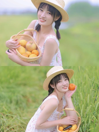 一个戴帽子年轻女子手持一篮子橙子在草地上