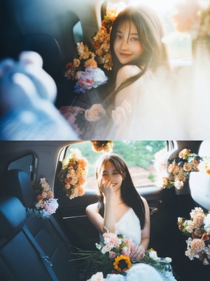 一位坐在汽车里的新娘 照片中有花。