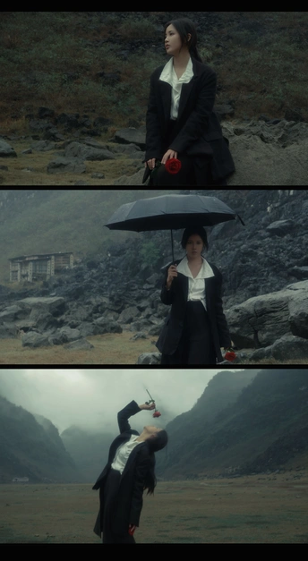 一个拿着黑色雨伞站在女人旁边的男人