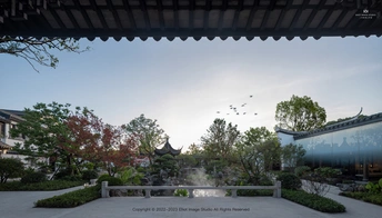 一个带喷泉和背景建筑的庭院