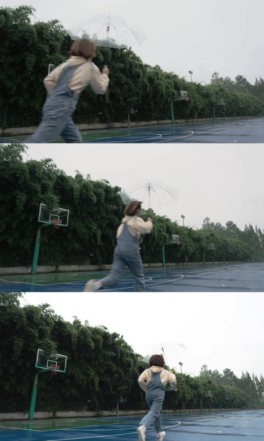 雨中打篮球的男人和跳绳上的女人持伞