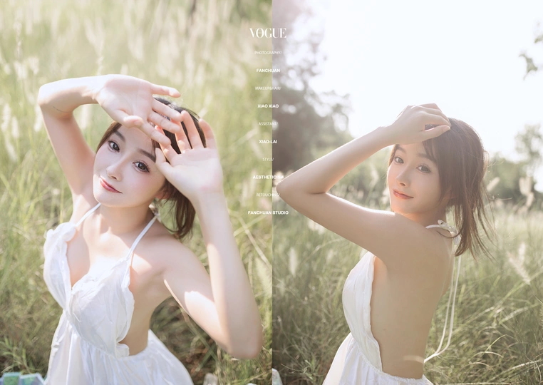 一位穿着白裙子的年轻女子在草地上为拍照摆姿势