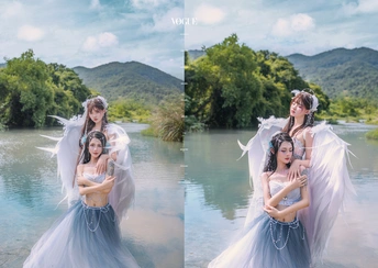 一位穿着蓝色婚纱的美新娘在湖中