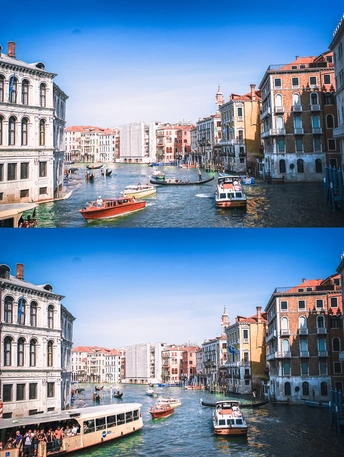 水中有建筑物和船只的城市的照片